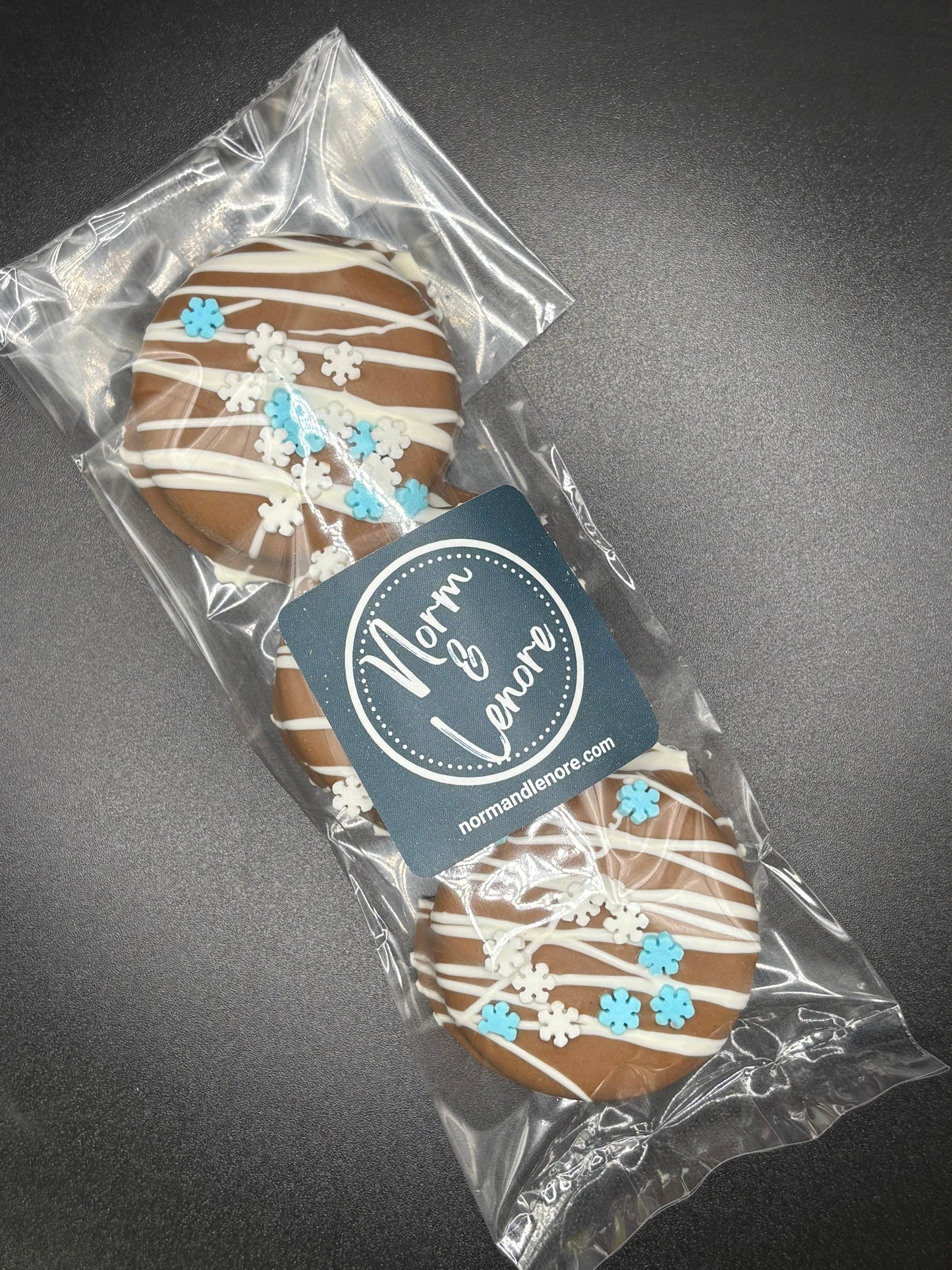 Norm & Lenore - Holiday Snowflake Milk Chocolate Oreo
